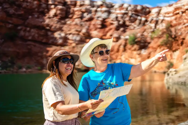 Couple on vacation looking at sites