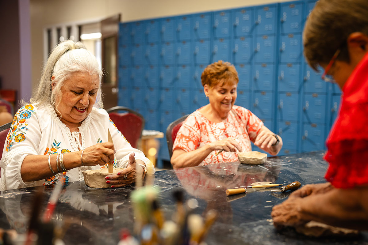 three-women-taking-a-craft-class-at-a-senior-center three women taking a craft class at a senior center