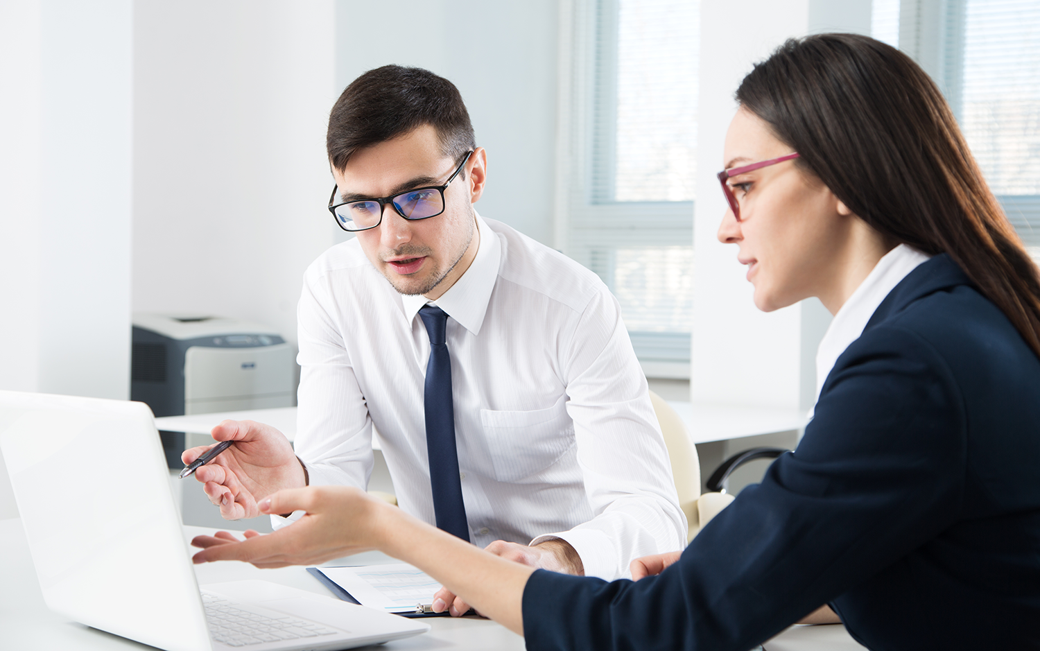 Policy and Planning, a man and a woman discussing a decision