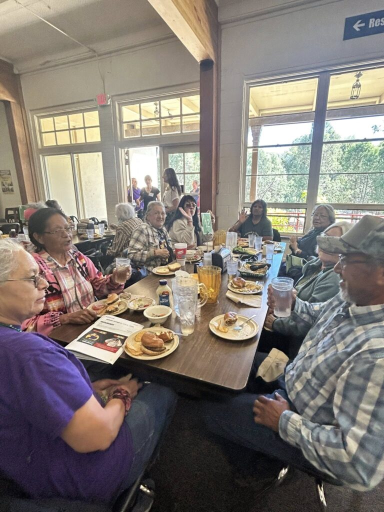 group of seniors eating at a table