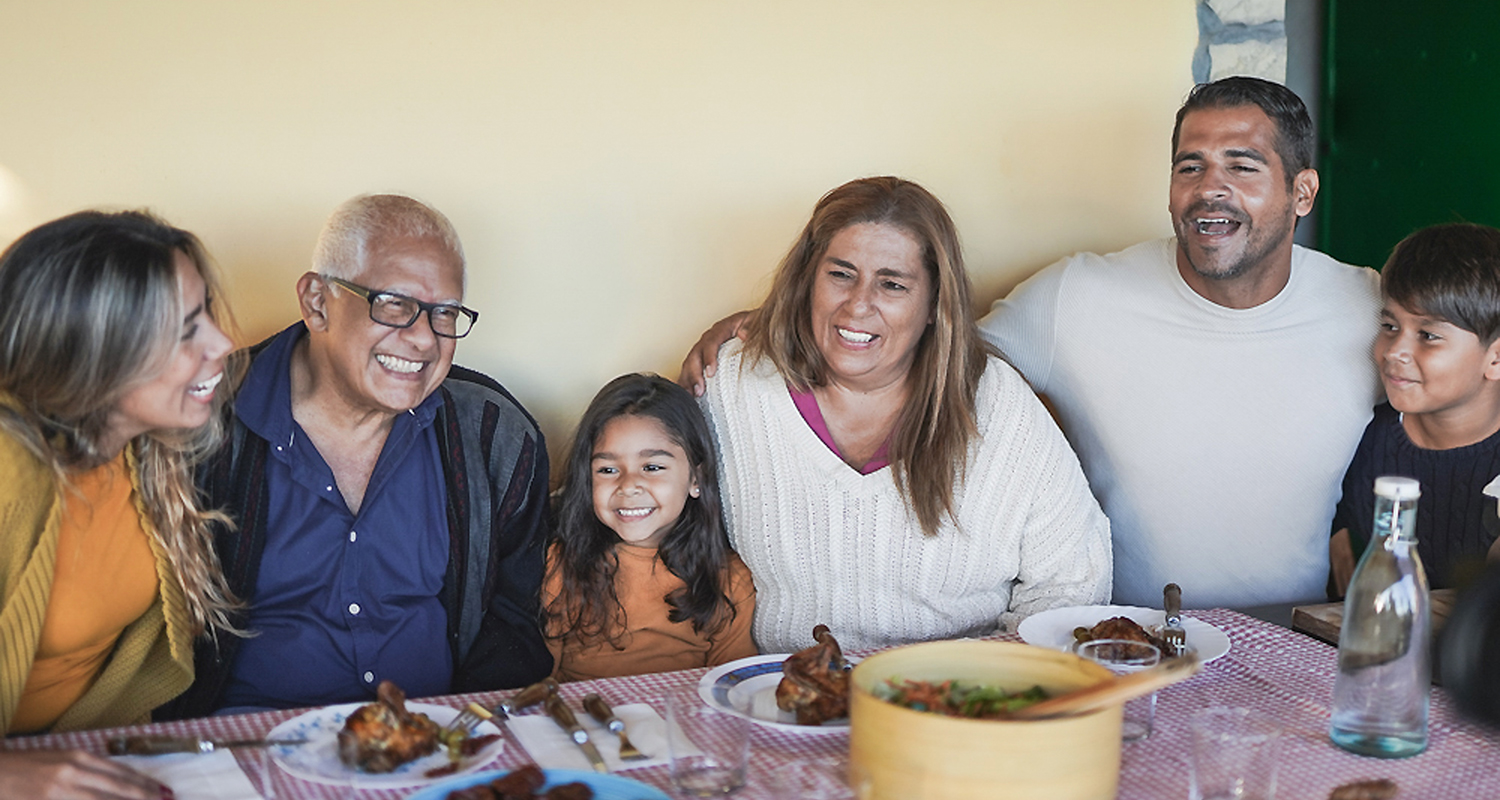 New Mexican Family Enjoying a Thanksgiving Meal together.